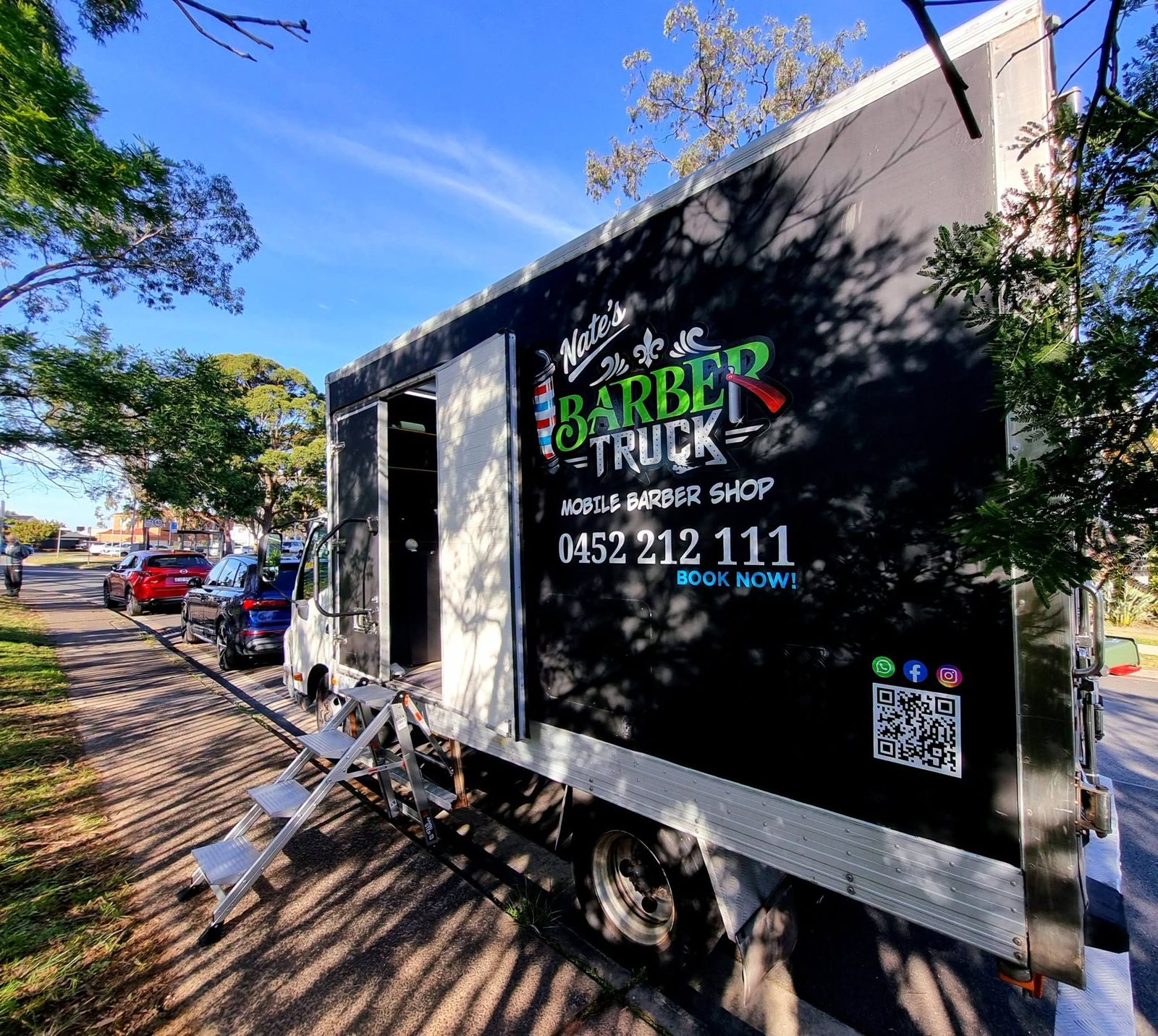 Nate's Barber Truck parked on a Shire street